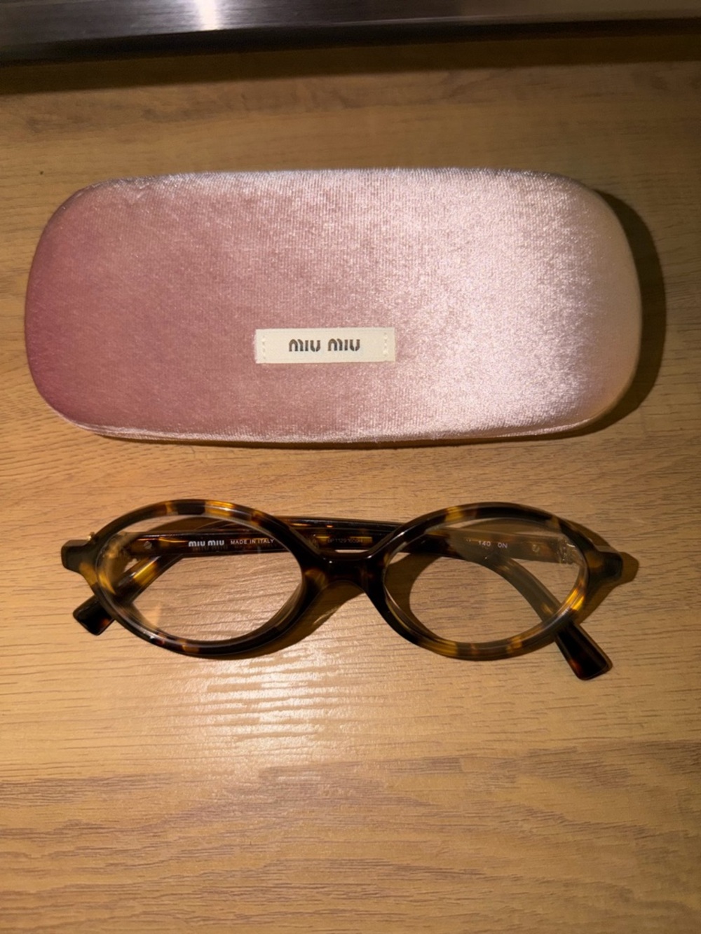MIU MIU round glasses